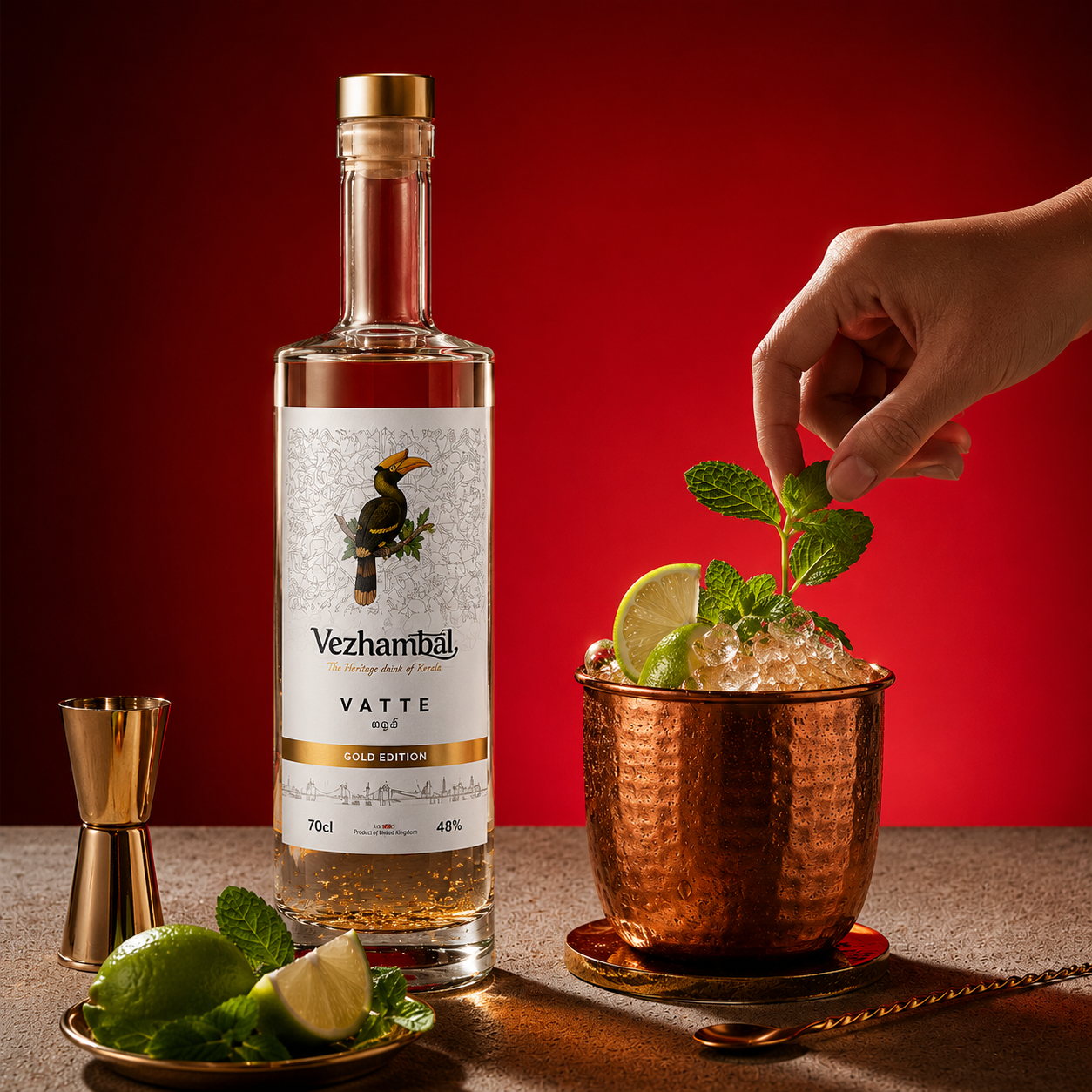 VEZHAMBAL Gold Edition served over crushed ice with fresh lime and mint