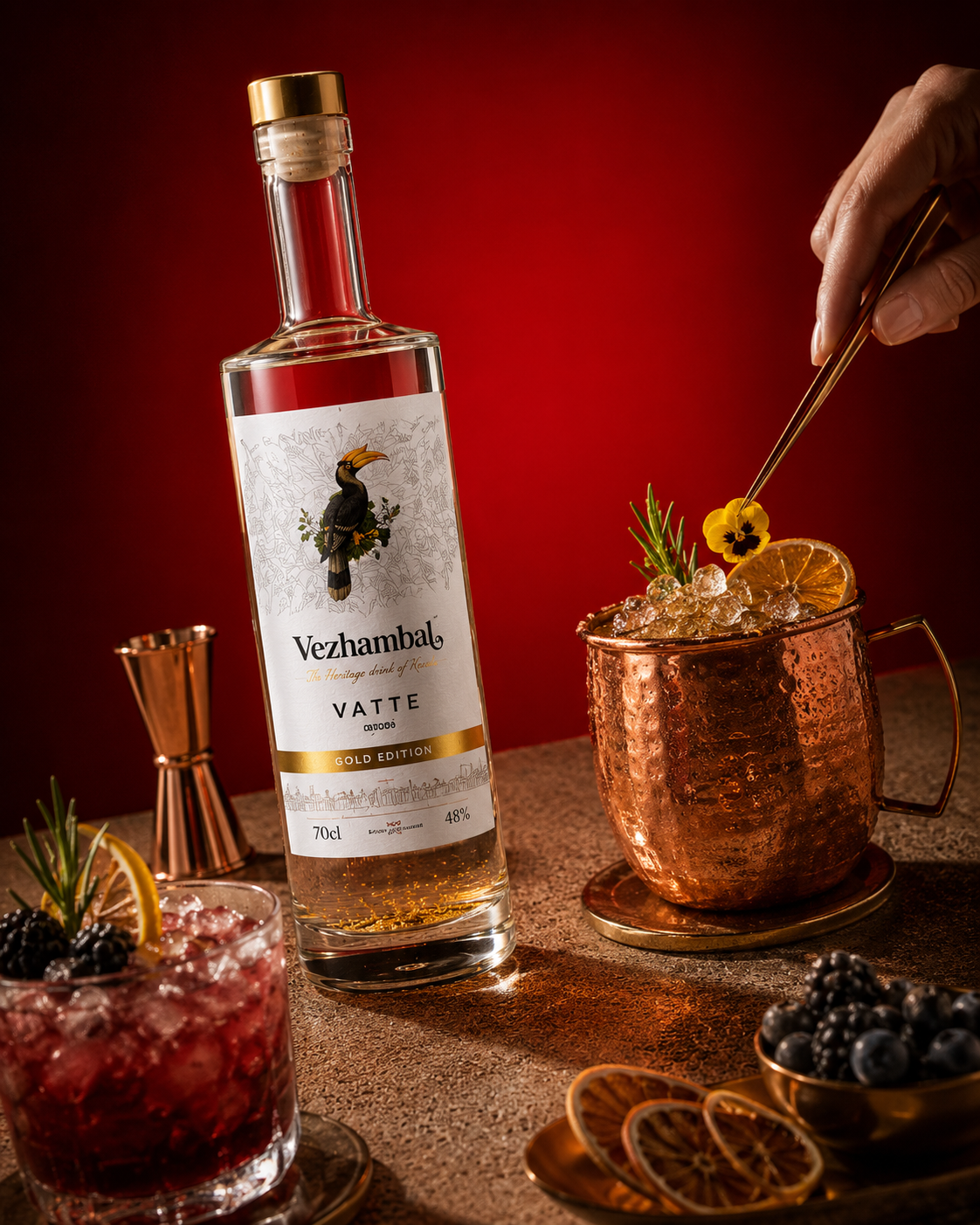 VEZHAMBAL Gold Edition cocktails garnished with citrus, berries and herbs