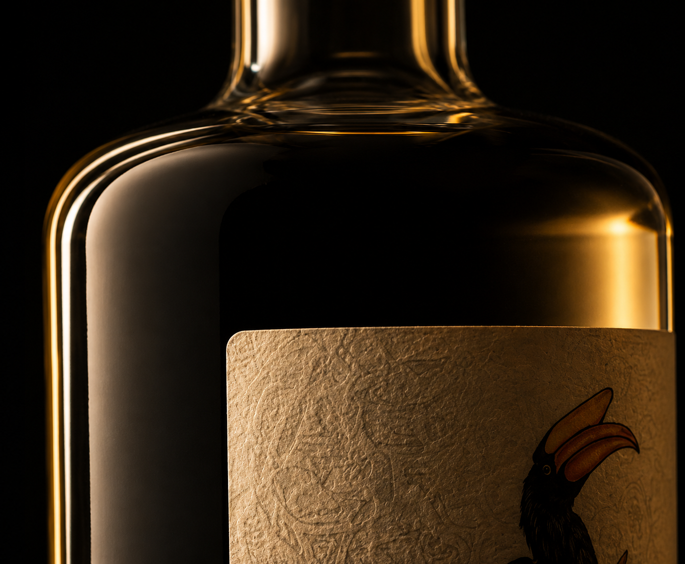 Bottle shoulder with embossed label detail